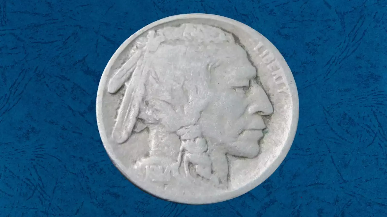 1914 Buffalo Nickel off-center strike error showing blank planchet crescent with readable date
